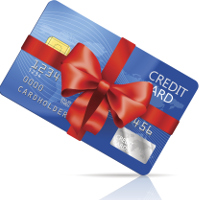 Una tarjeta de crédito envuelta en un lazo de regalo.